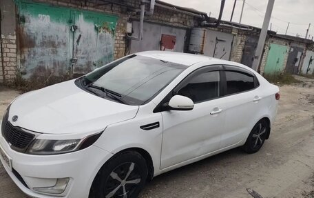 KIA Rio III рестайлинг, 2012 год, 550 000 рублей, 2 фотография