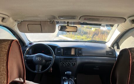 Toyota Corolla, 2004 год, 660 000 рублей, 10 фотография