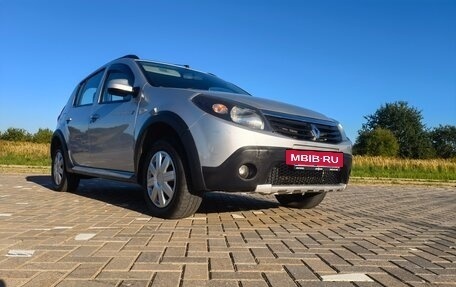 Renault Sandero I, 2012 год, 791 000 рублей, 2 фотография