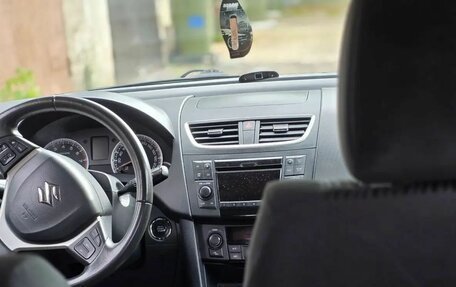 Suzuki Swift IV, 2011 год, 743 000 рублей, 20 фотография