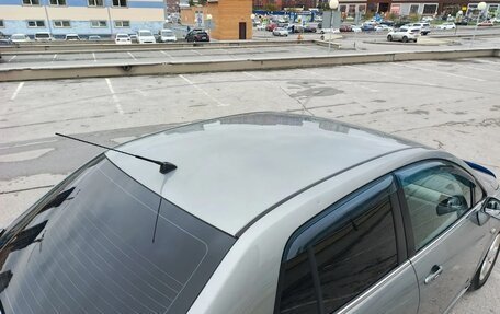 Nissan Tiida, 2010 год, 715 000 рублей, 8 фотография