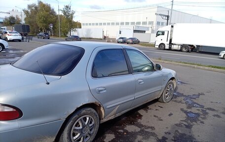KIA Clarus I, 1997 год, 199 000 рублей, 1 фотография