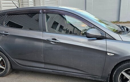 Hyundai Solaris II рестайлинг, 2011 год, 700 000 рублей, 9 фотография
