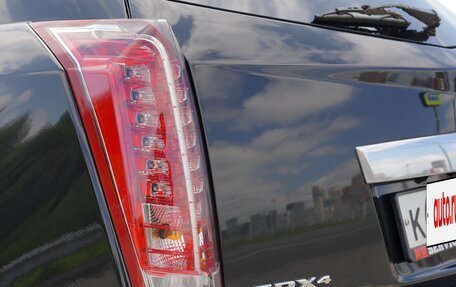 Cadillac SRX II рестайлинг, 2011 год, 1 990 000 рублей, 34 фотография