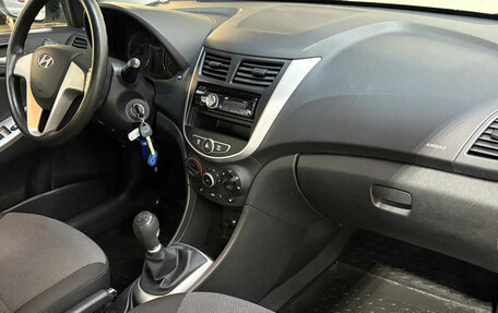 Hyundai Solaris II рестайлинг, 2011 год, 730 000 рублей, 21 фотография