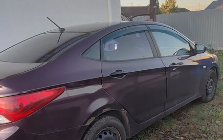 Hyundai Solaris II рестайлинг, 2011 год, 600 000 рублей, 7 фотография