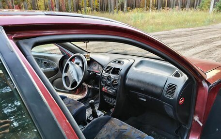 Mitsubishi Carisma I, 1997 год, 200 000 рублей, 8 фотография