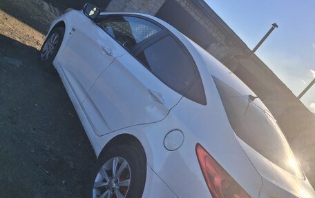 Hyundai Solaris II рестайлинг, 2011 год, 475 000 рублей, 3 фотография