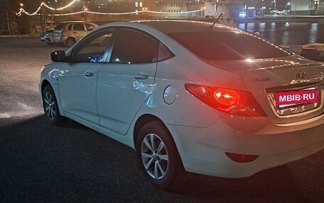 Hyundai Solaris II рестайлинг, 2011 год, 475 000 рублей, 14 фотография