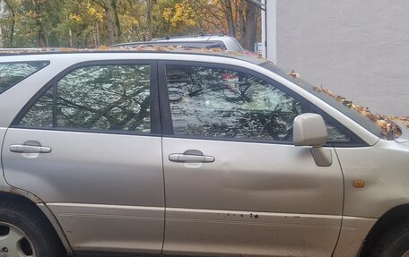 Lexus RX IV рестайлинг, 2000 год, 750 000 рублей, 9 фотография