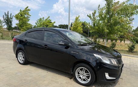 KIA Rio III рестайлинг, 2012 год, 850 000 рублей, 2 фотография