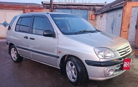Toyota Raum I, 2002 год, 375 000 рублей, 2 фотография
