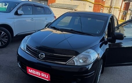 Nissan Tiida, 2010 год, 690 000 рублей, 6 фотография