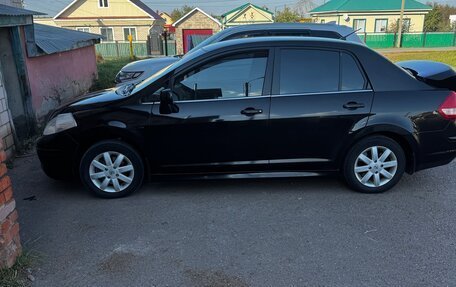 Nissan Tiida, 2010 год, 690 000 рублей, 9 фотография