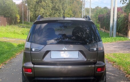 Mitsubishi Outlander III рестайлинг 3, 2011 год, 800 000 рублей, 4 фотография