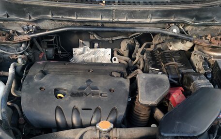 Mitsubishi Outlander III рестайлинг 3, 2011 год, 800 000 рублей, 10 фотография
