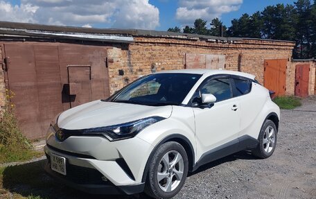 Toyota C-HR I рестайлинг, 2018 год, 2 230 000 рублей, 21 фотография