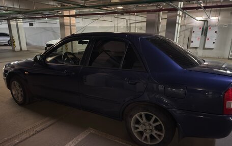 Mazda 323, 2000 год, 310 000 рублей, 4 фотография