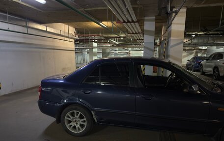 Mazda 323, 2000 год, 310 000 рублей, 7 фотография