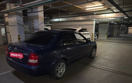Mazda 323, 2000 год, 310 000 рублей, 9 фотография
