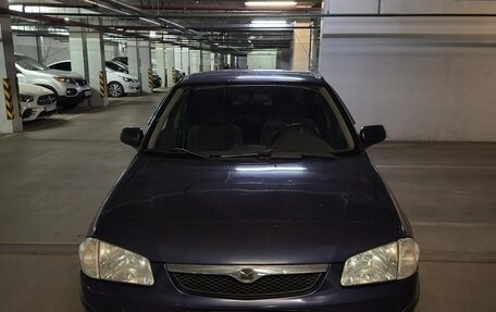 Mazda 323, 2000 год, 310 000 рублей, 11 фотография