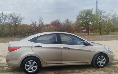 Hyundai Solaris II рестайлинг, 2011 год, 627 000 рублей, 3 фотография