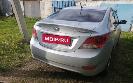 Hyundai Solaris II рестайлинг, 2011 год, 690 000 рублей, 14 фотография