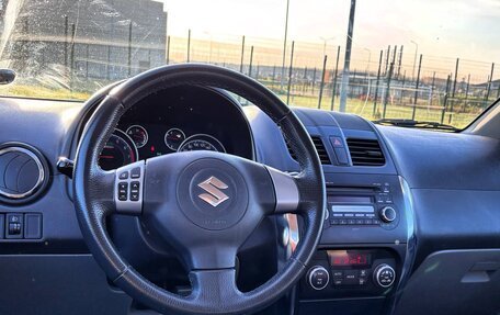 Suzuki SX4 II рестайлинг, 2011 год, 899 000 рублей, 27 фотография