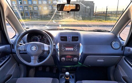Suzuki SX4 II рестайлинг, 2011 год, 899 000 рублей, 24 фотография