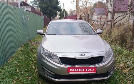 KIA Optima III рестайлинг, 2011 год, 850 000 рублей, 23 фотография