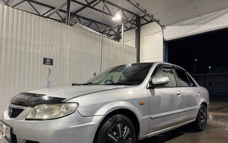 Mazda Familia, 2001 год, 310 000 рублей, 3 фотография