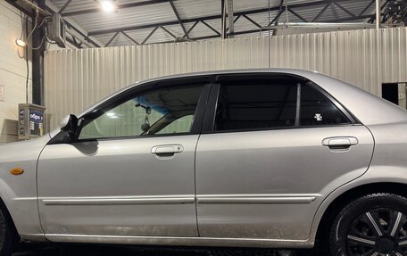 Mazda Familia, 2001 год, 310 000 рублей, 4 фотография