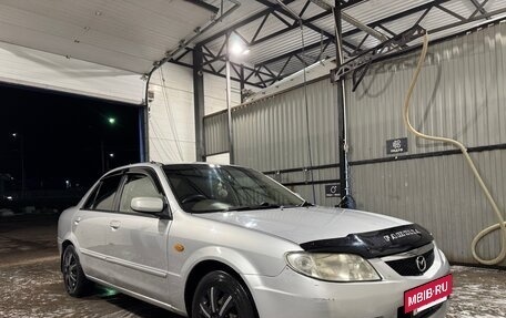 Mazda Familia, 2001 год, 310 000 рублей, 7 фотография