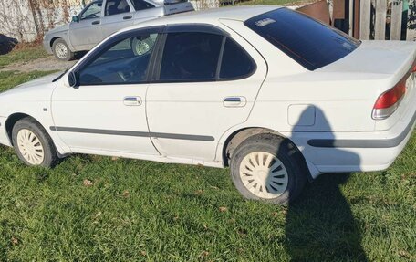 Nissan Sunny B15, 2000 год, 300 000 рублей, 4 фотография