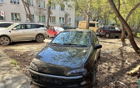 Opel Tigra, 1999 год, 85 000 рублей, 5 фотография