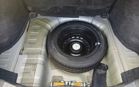 Nissan Tiida, 2010 год, 790 000 рублей, 10 фотография