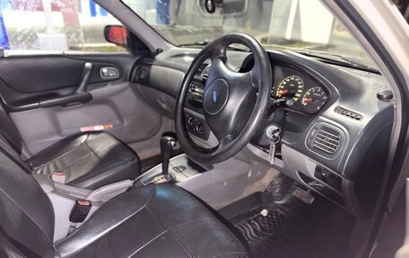 Ford Laser IV, 2001 год, 190 000 рублей, 13 фотография