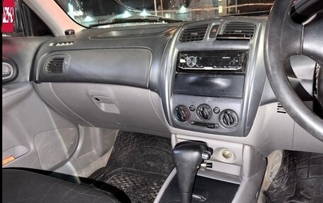 Ford Laser IV, 2001 год, 190 000 рублей, 5 фотография