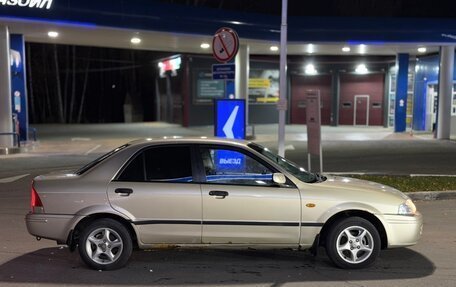 Ford Laser IV, 2001 год, 190 000 рублей, 22 фотография