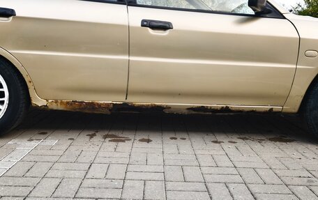Mitsubishi Mirage VI рестайлинг, 2000 год, 270 000 рублей, 6 фотография