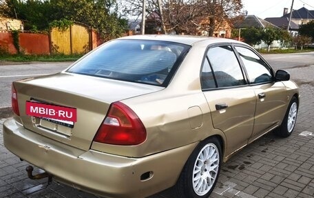 Mitsubishi Mirage VI рестайлинг, 2000 год, 270 000 рублей, 5 фотография