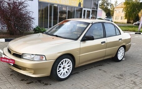 Mitsubishi Mirage VI рестайлинг, 2000 год, 270 000 рублей, 3 фотография