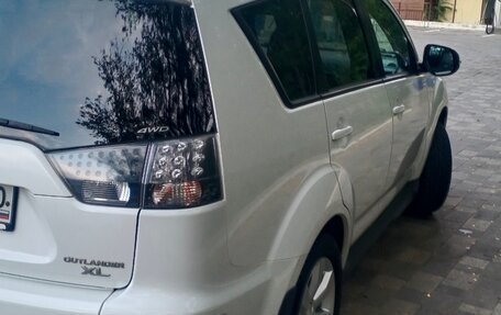 Mitsubishi Outlander III рестайлинг 3, 2010 год, 1 350 000 рублей, 11 фотография