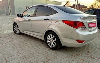 Hyundai Solaris II рестайлинг, 2011 год, 700 000 рублей, 1 фотография
