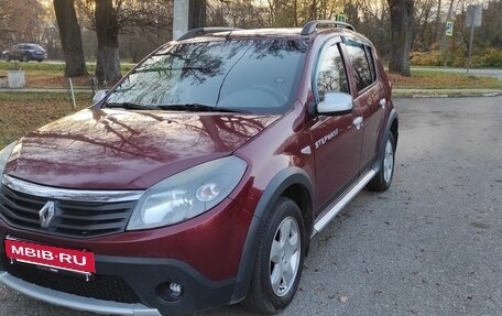Renault Sandero I, 2013 год, 749 000 рублей, 2 фотография