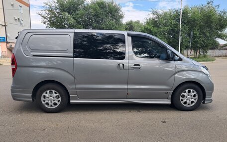 Hyundai Grand Starex Grand Starex I рестайлинг 2, 2011 год, 1 550 000 рублей, 2 фотография