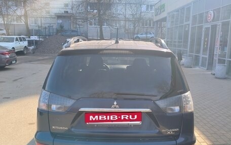 Mitsubishi Outlander III рестайлинг 3, 2010 год, 900 000 рублей, 6 фотография