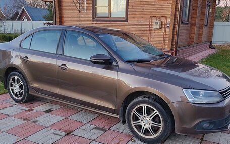 Volkswagen Jetta VII, 2012 год, 1 050 000 рублей, 1 фотография