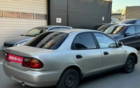 Mazda 323, 1994 год, 110 000 рублей, 3 фотография