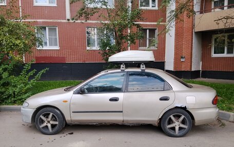 Mazda 323, 1994 год, 100 000 рублей, 3 фотография